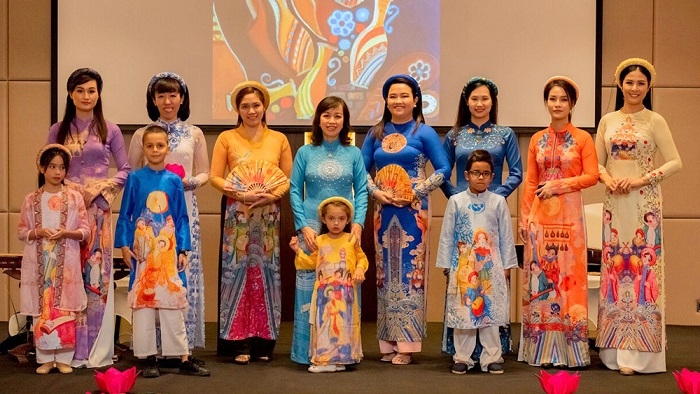 Young Vietnamese women wearing traditional ao dai dresses at Hue's